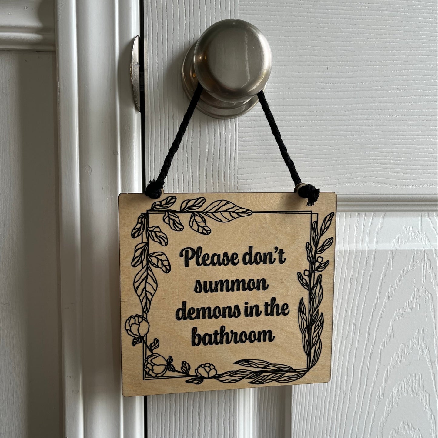 Demons Bathroom Sign